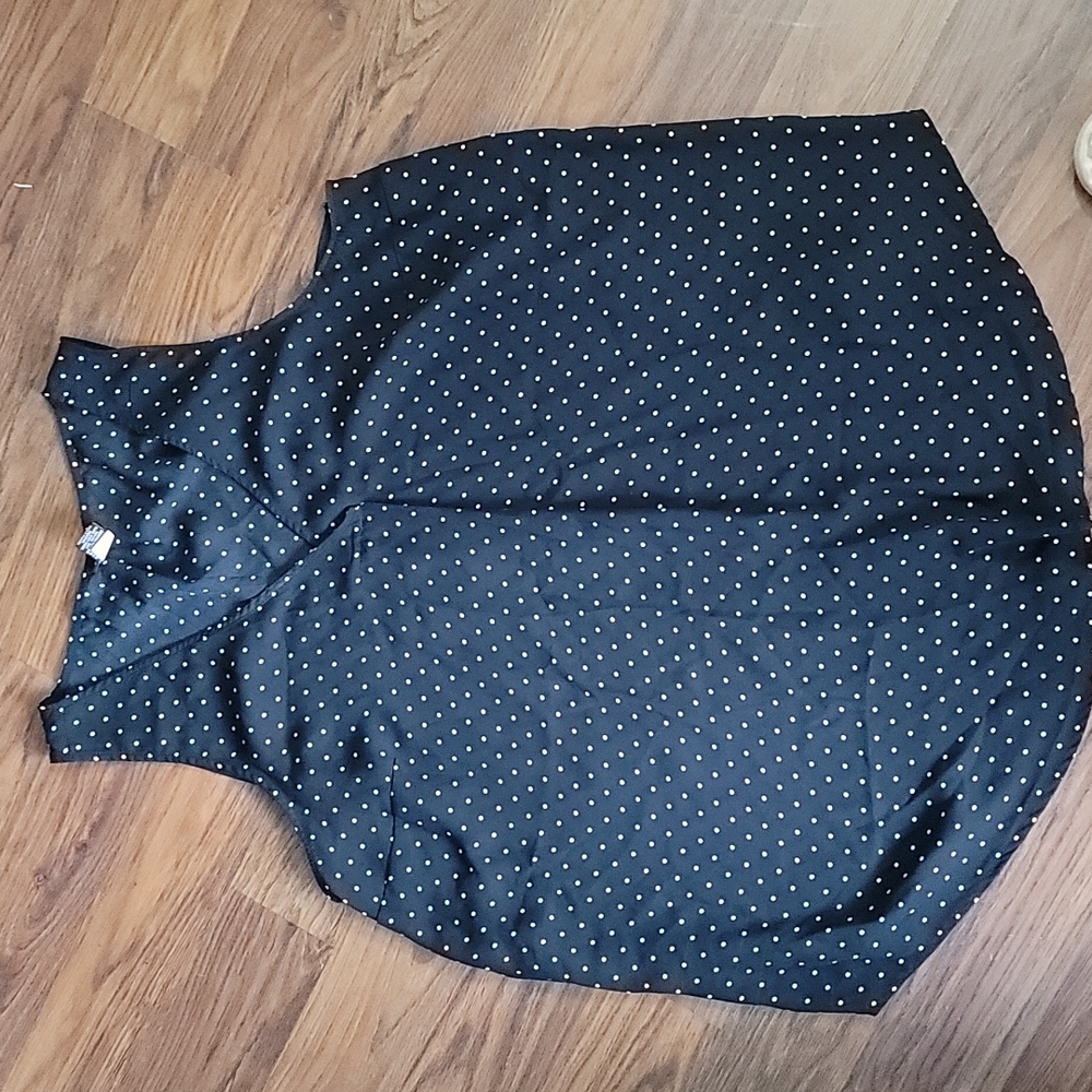 Used Torrid top, size 2. Black with white